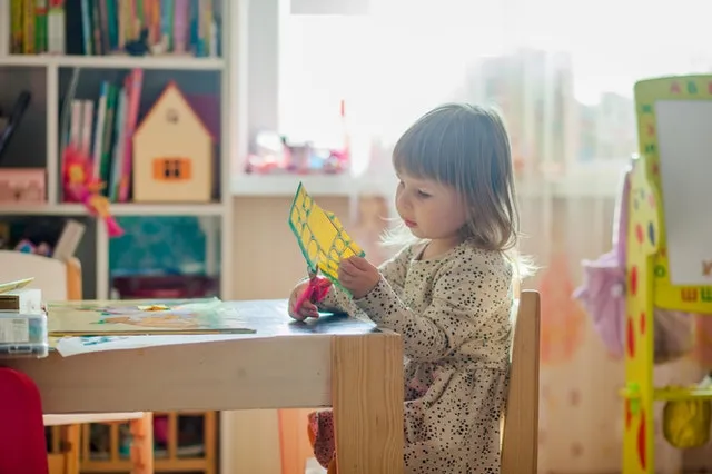 Child using scissors