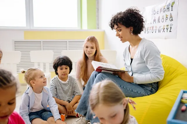 Teacher reading to kids